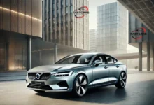 2025 Volvo S60 sedan in an urban setting, highlighting its sleek design.